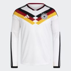 Koszulka Germany 26 Home z długim rękawem. Białe koszulki męskie z długim rękawem ADIDAS, bez wzorów, sportowe, bez kołnierzyka, bez ramiączek. Za 479.00 zł.