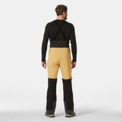 Spodnie narciarskie z szelkami Helly Hansen Odin BC Softshell. Brązowe spodnie narciarskie i snowboardowe męskie Helly Hansen, bez wzorów, z softshellu, narciarskie. Za 1,536.00 zł.