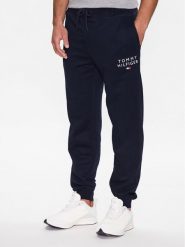 Tommy Hilfiger Spodnie dresowe UM0UM02880 Granatowy Regular Fit. Niebieskie spodnie dresowe męskie Tommy Hilfiger, bez wzorów, z dresówki. Za 299.99 zł.