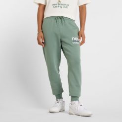 Spodnie męskie New Balance MP51940DKJ – zielone. Zielone spodnie dresowe męskie New Balance, bez wzorów, z bawełny. Za 219.99 zł.