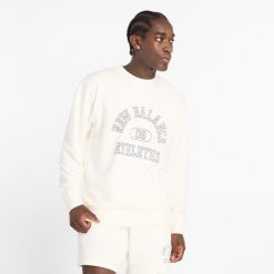 Bluza męska New Balance MT43507SST – beżowa. Brązowe bluzy nierozpinane męskie New Balance, m, bez wzorów, z bawełny, klasyczne, bez ramiączek, bez kaptura. Za 149.99 zł.