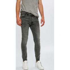Wrangler - Jeansy Strangler. Jeansy męskie marki Wrangler. W wyprzedaży za 279.90 zł.