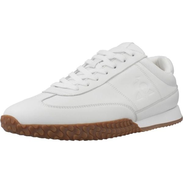 Buty LE COQ SPORTIF VELOCE I Biały. Białe buty trekkingowe męskie le coq sportif, bez wzorów, ze skóry, sportowe, bez obcasa, bez zapięcia. Za 253.99 zł.