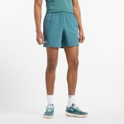 Spodenki męskie New Balance MS51402NUS – niebieskie. Niebieskie szorty sportowe męskie New Balance, bez wzorów, z lycry. Za 269.99 zł.