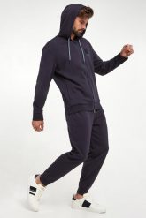 Spodnie dresowe męskie ARMANI EXCHANGE. Spodnie dresowe męskie Armani Exchange, bez wzorów, z dresówki. W wyprzedaży za 489.30 zł.
