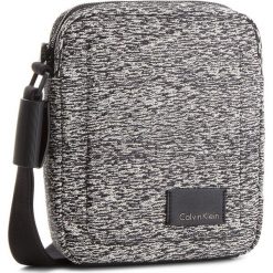 Saszetka CALVIN KLEIN - Ilay Jacquard Report K50K502887 907. Saszetki męskie marki Calvin Klein. W wyprzedaży za 249.00 zł.