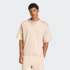 Koszulka Soft Lux Tee. Białe t-shirty sportowe męskie ADIDAS, bez wzorów, z materiału, sportowe, bez ramiączek. Za 199.00 zł.