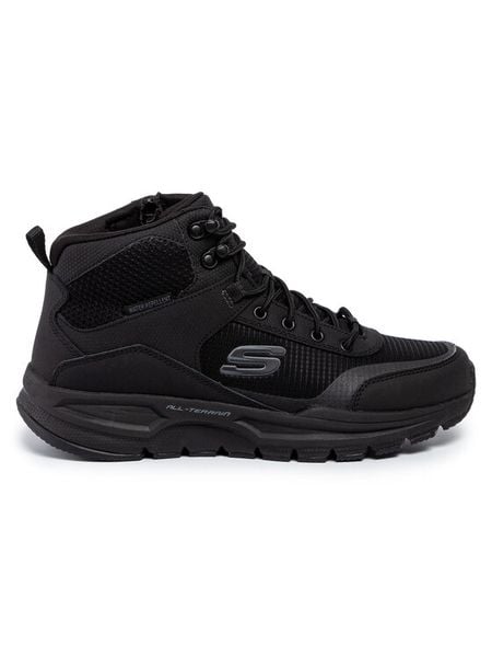 Skechers Trapery Woodrock 51705/BBK Czarny. Czarne buty zimowe męskie Skechers, bez wzorów, z materiału, bez obcasa, bez zapięcia. Za 346.79 zł.