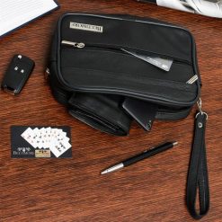 Saszetka męska skórzana do ręki czarna Beltimore R02. Czarne saszetki męskie bez wzorów. Za 99.90 zł.