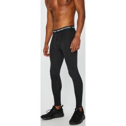 Calvin Klein Performance - Spodnie. Czarne długie spodnie sportowe męskie Calvin Klein Performance, bez wzorów, z dzianiny. W wyprzedaży za 129.90 zł.
