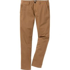 Spodnie chino ocieplane Regular Fit bonprix koniakowy. Eleganckie spodnie męskie marki bonprix. Za 59.99 zł.