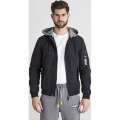 KURTKA AVIATOR GUESS. Czarne kurtki męskie Guess, l, z aplikacjami, bez ramiączek. Za 407.40 zł.