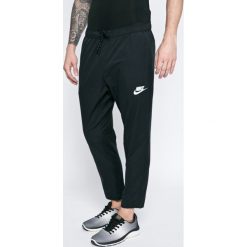 Nike Sportswear - Spodnie. Długie spodnie sportowe męskie marki Nike Sportswear. W wyprzedaży za 139.90 zł.