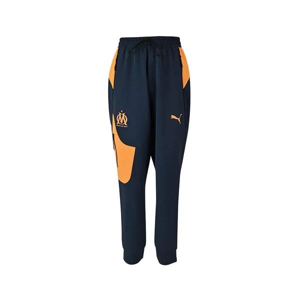 Spodnie dresowe OM Pumatech. Brązowe spodnie dresowe męskie Puma, bez wzorów, z dresówki. W wyprzedaży za 247.05 zł.