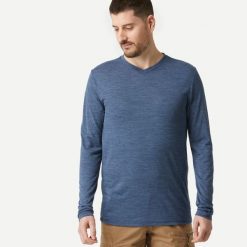 Koszulka trekkingowa z długim rękawem męska Forclaz Travel 500 Merino. Niebieskie koszulki męskie z długim rękawem FORCLAZ, l, bez wzorów, z materiału, sportowe, bez kołnierzyka, bez ramiączek. Za 129.99 zł.