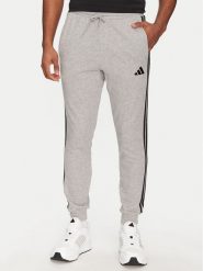 Adidas Spodnie dresowe Essential 3-Stripes JE6346 Szary Regular Fit. Szare spodnie dresowe męskie ADIDAS, bez wzorów, z dresówki. Za 149.99 zł.