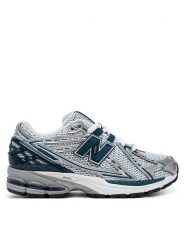 New Balance Sneakersy U1906RCE Srebrny. Szare buty sportowe na co dzień męskie New Balance, m, bez wzorów, ze skóry, bez ramiączek, bez kaptura. Za 449.99 zł.