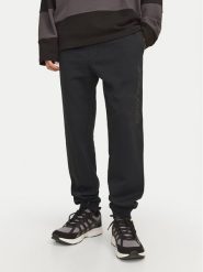 Jack & Jones Spodnie dresowe Gordon 12258477 Czarny Regular Fit. Czarne spodnie dresowe męskie Jack & Jones, bez wzorów, z dresówki. Za 69.99 zł.