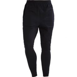 Under Armour Legginsy black/black. Czarne legginsy męskie Under Armour, z elastanu. W wyprzedaży za 411.75 zł.