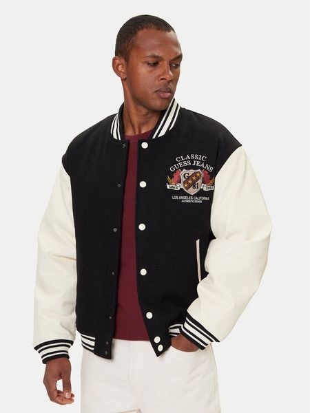 Guess Jeans Kurtka bomber M5BL1E WEI02 Czarny Regular Fit. Czarne kurtki męskie Guess Jeans, m, z aplikacjami, z jeansu, bez ramiączek, bez kaptura. Za 517.30 zł.