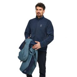 Polar Haglöfs Mossa Pile. Niebieskie bluzy z polaru męskie Haglöfs, l, bez wzorów, z polaru, sportowe, bez ramiączek, bez kaptura. W wyprzedaży za 591.15 zł.