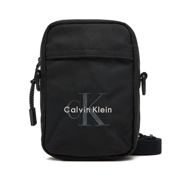 Saszetka Calvin Klein. Czarne saszetki męskie Calvin Klein, bez wzorów, z nylonu, małe. Za 249.99 zł.