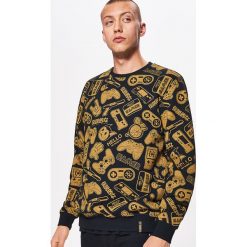 Bluza all over z kolekcji GAMERS - Czarny. Bluzy nierozpinane męskie marki DOMYOS. W wyprzedaży za 69.99 zł.