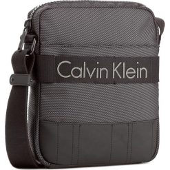 Saszetka CALVIN KLEIN - Madox Reporter K50K502853 001. Saszetki męskie marki Calvin Klein. W wyprzedaży za 329.00 zł.