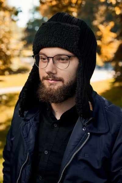 Zimowa czapka uszatka z polarem Brødrene cz3 czarna 9914. Czarne czapki męskie na zimę, bez wzorów, z polaru. Za 98.00 zł.