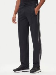 Plein Sport Spodnie dresowe FAEC MJT2680 STE003N Czarny Loose Fit. Czarne długie spodnie sportowe męskie Plein Sport, bez wzorów, z dresówki. Za 550.00 zł.