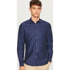 Koszula slim fit z bawełny strukturalnej - Granatowy. Niebieskie koszule męskie Reserved, z bawełny. Za 99.99 zł.