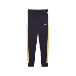 Młodzieżowe spodnie dresowe Essentials Block PUMA New Navy Blue. Niebieskia spodnie dresowe męskie Puma, bez wzorów, z dresówki. Za 115.99 zł.