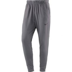 Spodnie sportowe "Dry" w kolorze szarym. Długie spodnie sportowe męskie marki Nike Performance. W wyprzedaży za 128.95 zł.