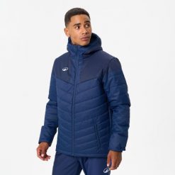 Krótka kurtka do piłki nożnej Kipsta. Niebieskie kurtki męskie KIPSTA, xs, bez wzorów, sportowe, bez ramiączek, bez kaptura. Za 279.99 zł.