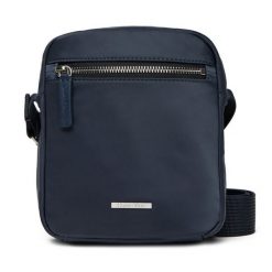 Saszetka Calvin Klein. Niebieskie saszetki męskie Calvin Klein, bez wzorów, z nylonu, młodzieżowe, małe. Za 269.99 zł.