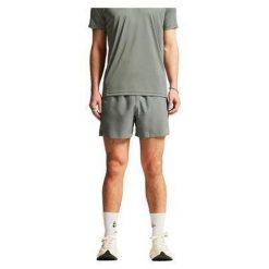 Szorty Craft Essence 2. Zielone szorty sportowe męskie 4M, bez wzorów, sportowe. Za 188.00 zł.