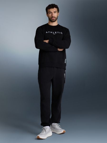 4F Bluza dresowa nierozpinana bez kaptura męska - czarna L. Czarne bluzy nierozpinane męskie 4f, l, bez wzorów, z dresówki, bez ramiączek, bez kaptura. Za 159.99 zł.