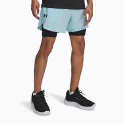 Spodenki męskie Under Armour Peak Woven 2in1. Niebieskie szorty sportowe męskie Under Armour, bez wzorów, sportowe. Za 209.99 zł.