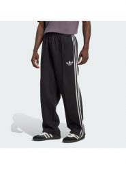 Adidas Spodnie dresowe adicolor Spacer Track JX1506 Czarny Baggy Fit. Czarne spodnie dresowe męskie ADIDAS, bez wzorów, z bawełny. Za 349.99 zł.