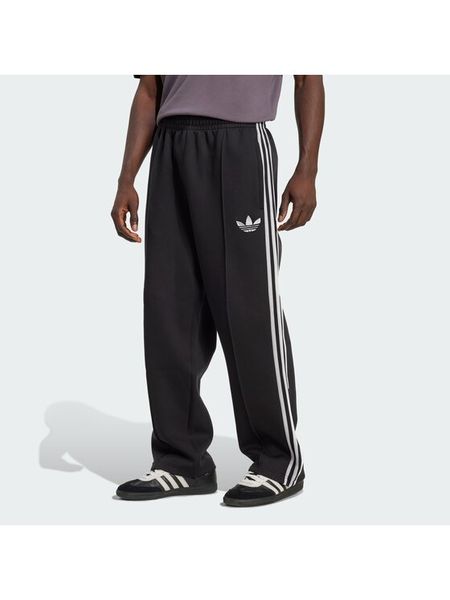 Adidas Spodnie dresowe adicolor Spacer Track JX1506 Czarny Baggy Fit. Czarne spodnie dresowe męskie ADIDAS, bez wzorów, z bawełny. Za 349.99 zł.
