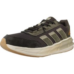 Buty ADIDAS ASTRASTAR Zielony. Zielone buty trekkingowe męskie ADIDAS, bez wzorów, z syntetyku, bez zapięcia, trekkingowe. Za 344.50 zł.