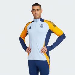 Bluza Real Madrid Tiro 24 Competition Training. Brązowe bluzy nierozpinane męskie ADIDAS, xs, bez wzorów, z materiału, sportowe, bez ramiączek, bez kaptura. W wyprzedaży za 270.55 zł.