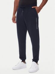 Tommy Hilfiger Spodnie dresowe UM0UM03664 Granatowy Regular Fit. Niebieskie spodnie dresowe męskie Tommy Hilfiger, bez wzorów, z dresówki. Za 269.99 zł.