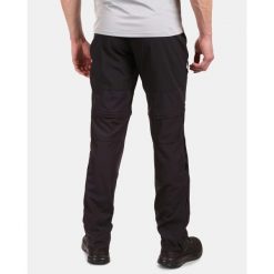 Spodnie Kilpi Hosio. Czarne eleganckie spodnie męskie Kilpi, bez wzorów, z nylonu, eleganckie. Za 370.41 zł.