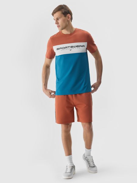 4F Spodenki dresowe męskie - brązowe L. Brązowe szorty męskie 4f, bez wzorów, z bawełny, sportowe. W wyprzedaży za 59.99 zł.