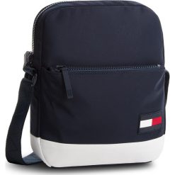 Saszetka TOMMY HILFIGER - Escape Reporter AM0AM03419 901. Saszetki męskie marki Tommy Hilfiger. W wyprzedaży za 239.00 zł.