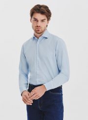 PAKO LORENTE - Jasnoniebieska koszula jeansowa. Koszule męskie Pako Lorente, l, bez wzorów, z bawełny, bez kołnierzyka, bez ramiączek. Za 199.99 zł.