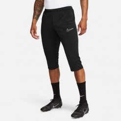 Spodnie treningowe męskie Nike Drifit Academy. Czarne spodnie dresowe męskie Nike, bez wzorów, z materiału, krótkie. Za 148.75 zł.