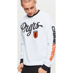 Bluza z nadrukami kolekcja PROGRESS - Biały. Bluzy nierozpinane męskie marki Cropp. W wyprzedaży za 49.99 zł.