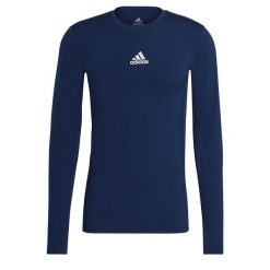 Koszulka piłkarska męska adidas Compression Long Sleeve Tee. Niebieskie bielizna termoaktywna męska ADIDAS, m, bez wzorów, bez ramiączek, do piłki nożnej. Za 99.99 zł.
